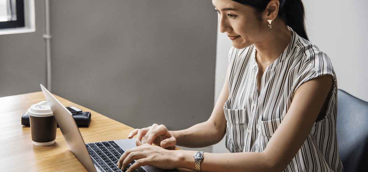 image of woman emailing on computer